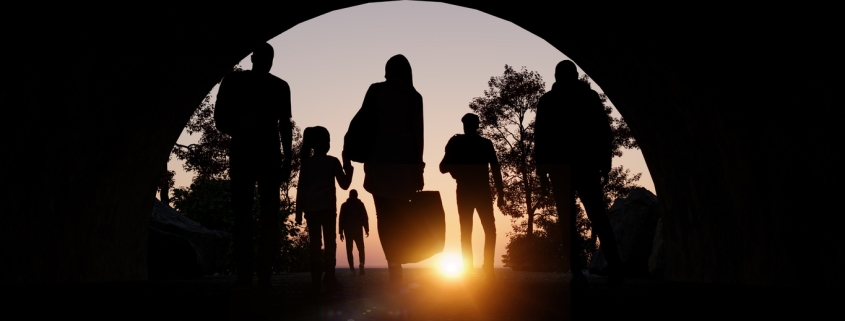 Refugees and immigrants looking for a new hope in life. Silhouette. Column of migrants passing through a tunnel. Abandon your lands for a better future. 3d rendering
