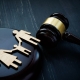 Family figures and court hammer. Family law and adoption concept.