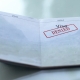 Visa denied, seal stamped in passport, customs office, travelling abroad