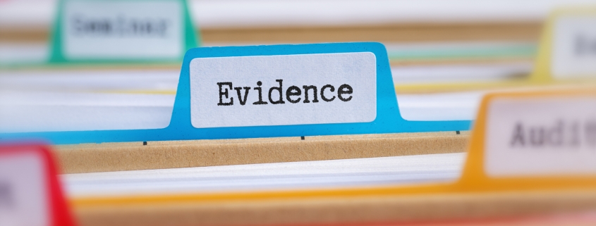 File folders with a tab labeled Evidence