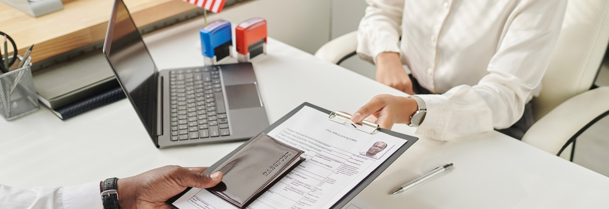Specialist taking document to make visa